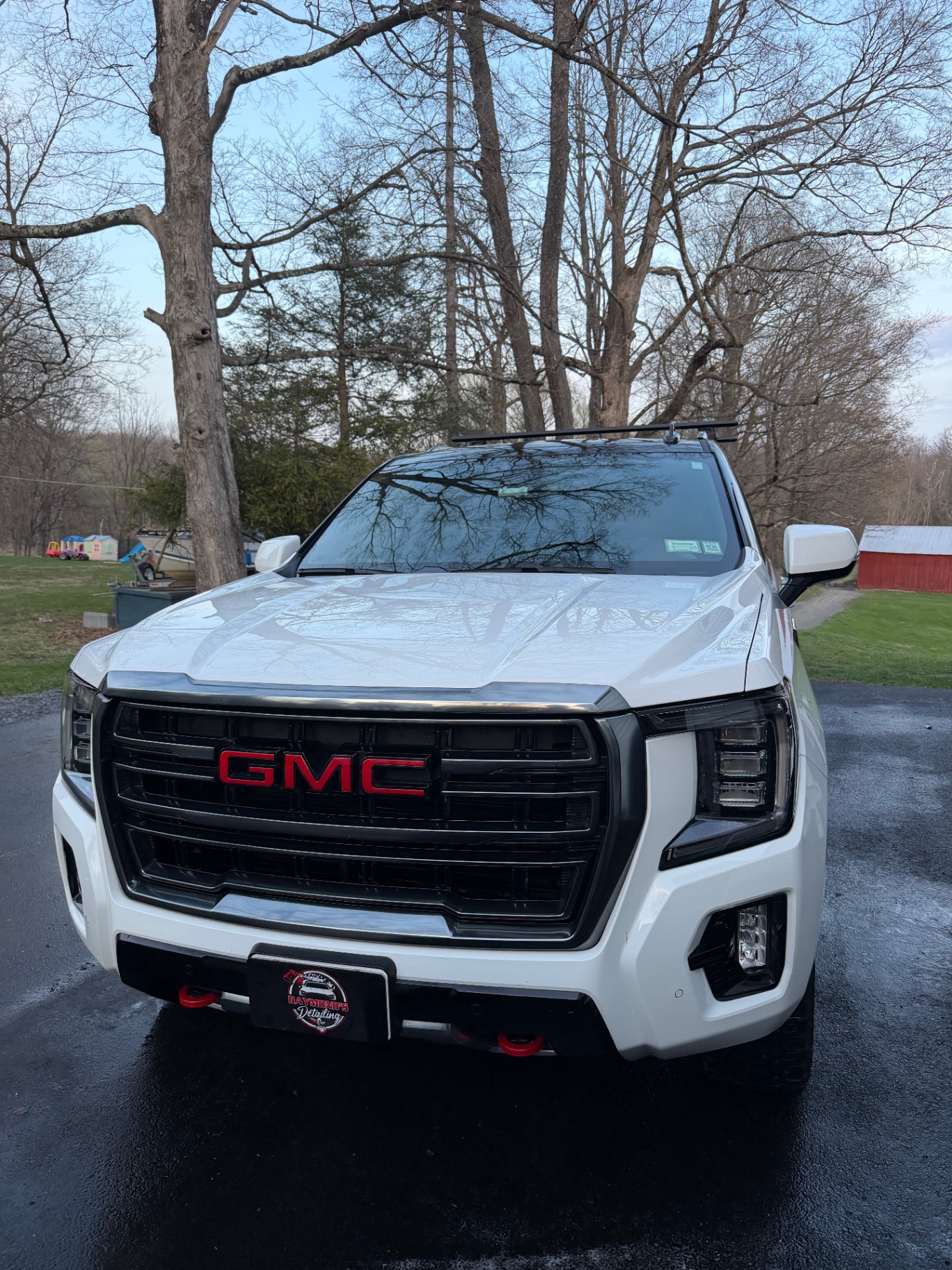 White GMC Yukon AT4 washed and polished