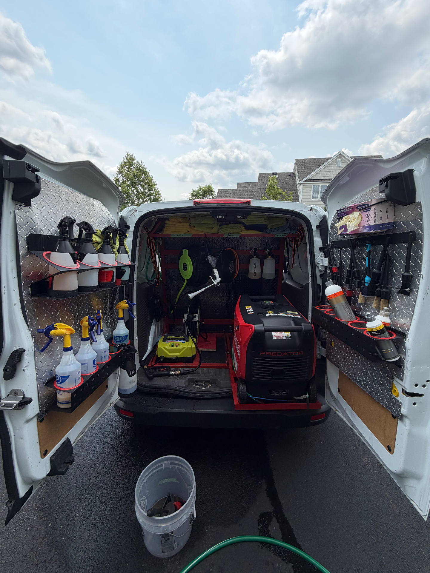 Raymond's Detailing mobile van fully stocked with detailing tools, generator, and supplies